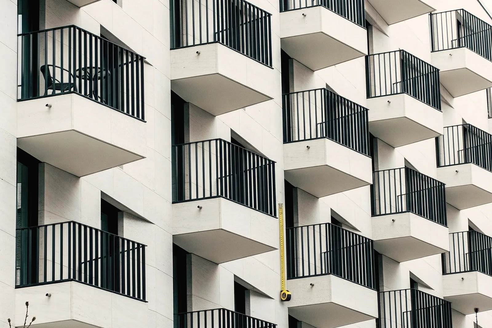Tape measure showing the height of a balcony railing